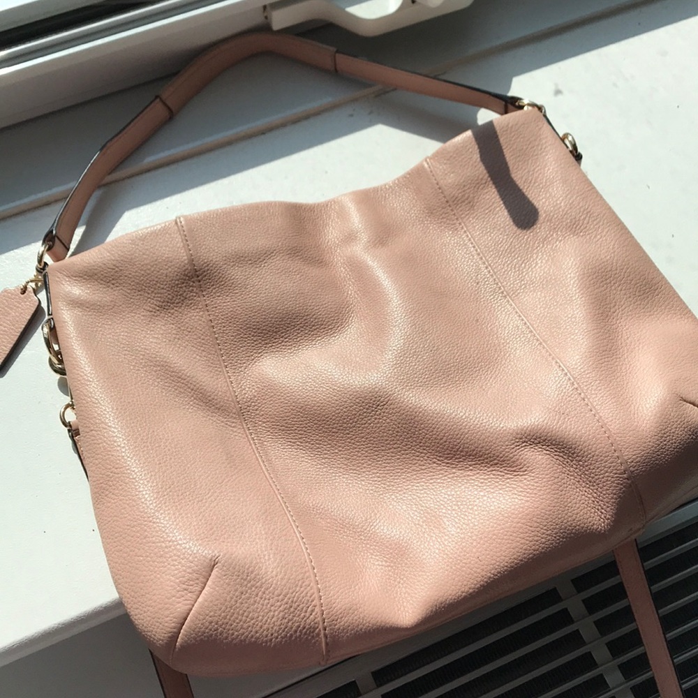 Well loved Coach Light pink bag